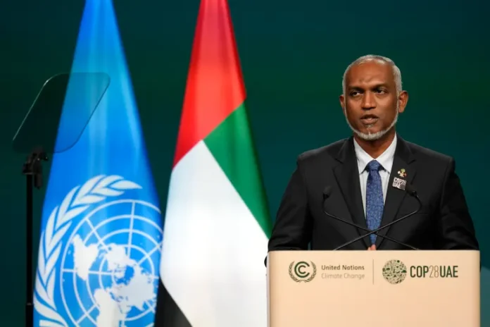 Maldives President Mohamed Muizzu speaks during a plenary session at the COP28